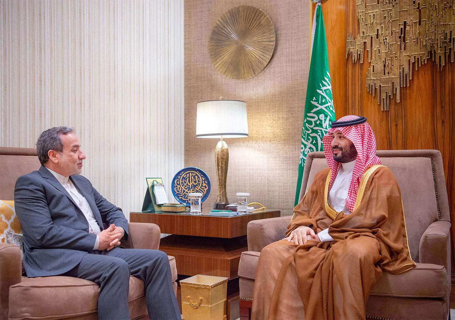 Saudi Crown Prince Mohammed bin Salman receiving Iran's FM Abbas Araqchi in Riyadh
