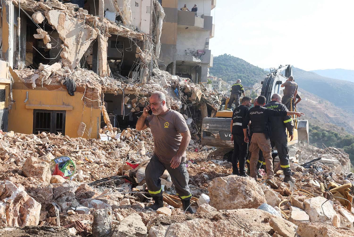 The aftermath of Israeli strike on Barja