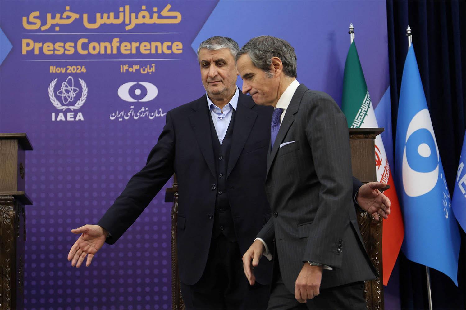 IAEA Director General Rafael Mariano Grossi and Head of Iran's Atomic Energy Organization Mohammad Eslami