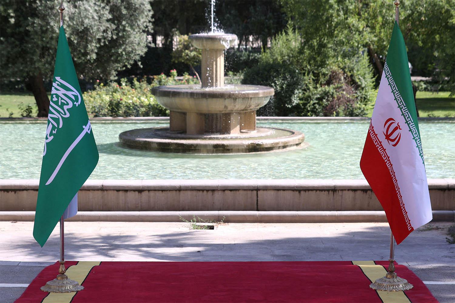 Saudi and Iranian flags