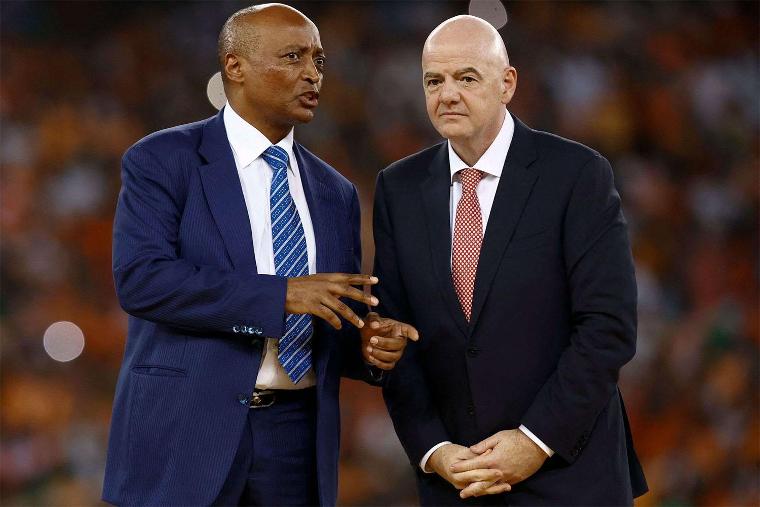 CAF President Patrice Motsepe (L)