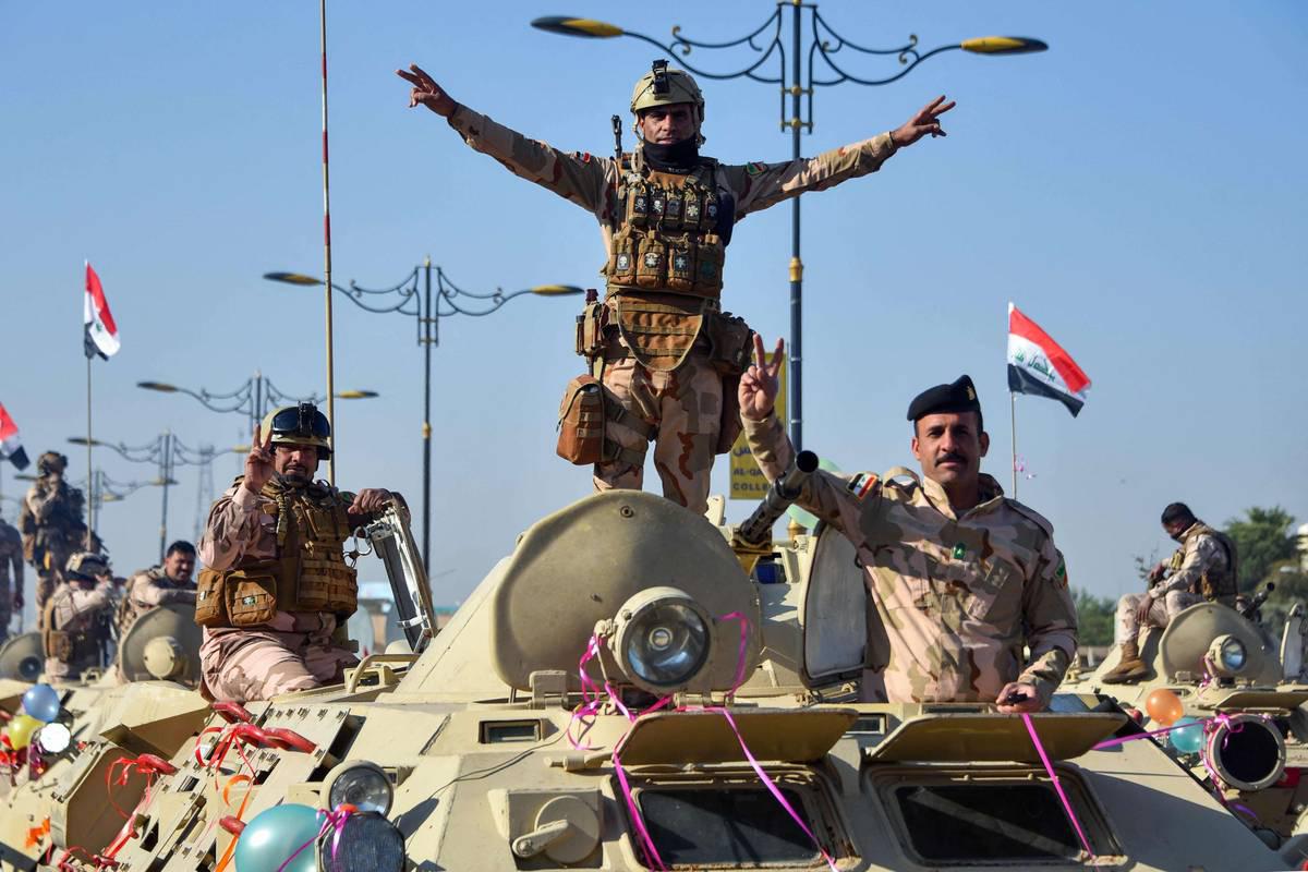 قوات من الحشد الشعبي تشارك في استعراض الجيش العراقي