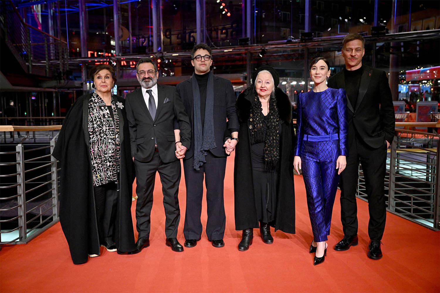 Cast member Georges Khabbaz, Hanna Schygulla, Sibel Kekilli, Tom Wlaschiha and Nidal Al Achkar and director Ameer Fakher Eldin attend the screening of the film Yunan at the 75th Berlinale International Film Festival in Berlin