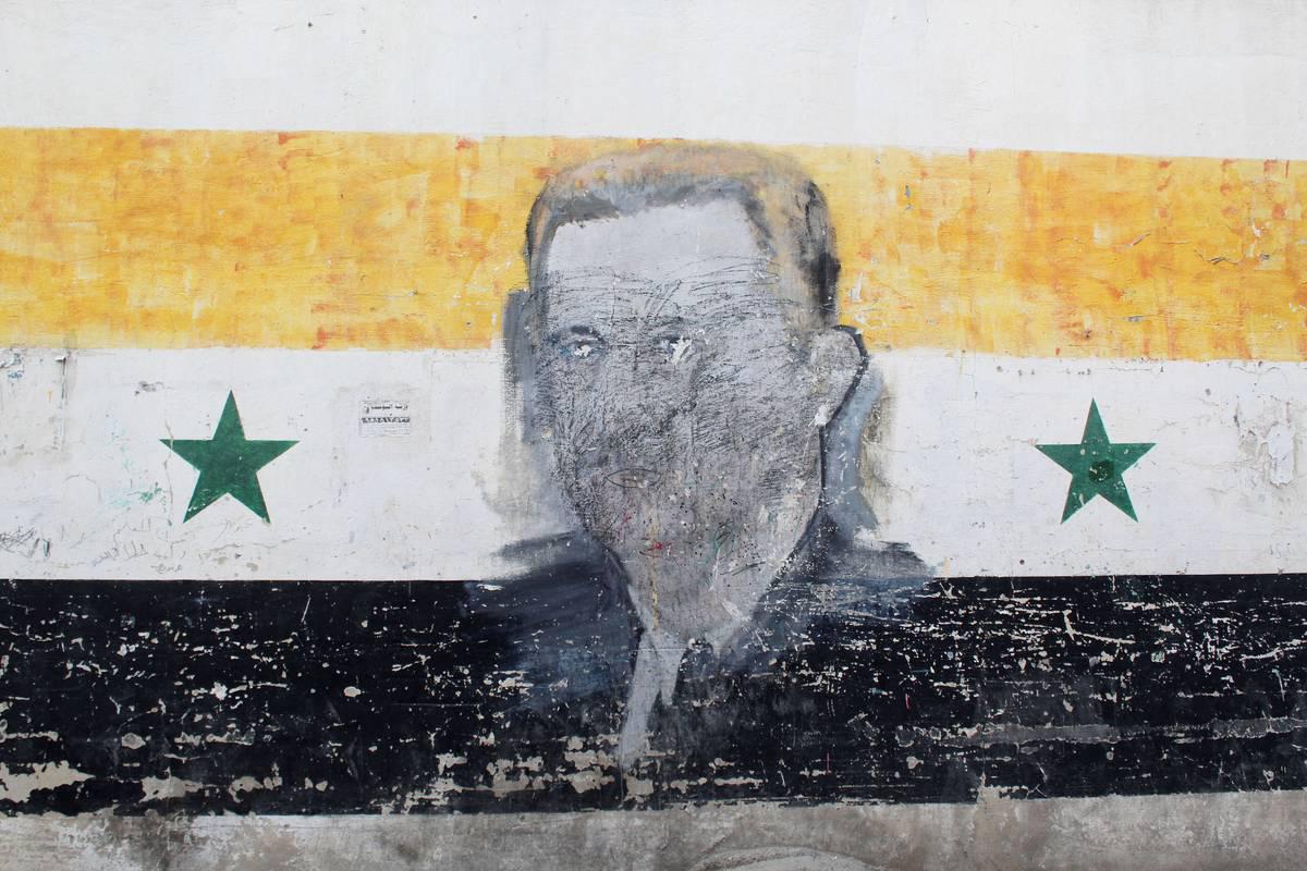 صورة مشوهة لبشار الأسد