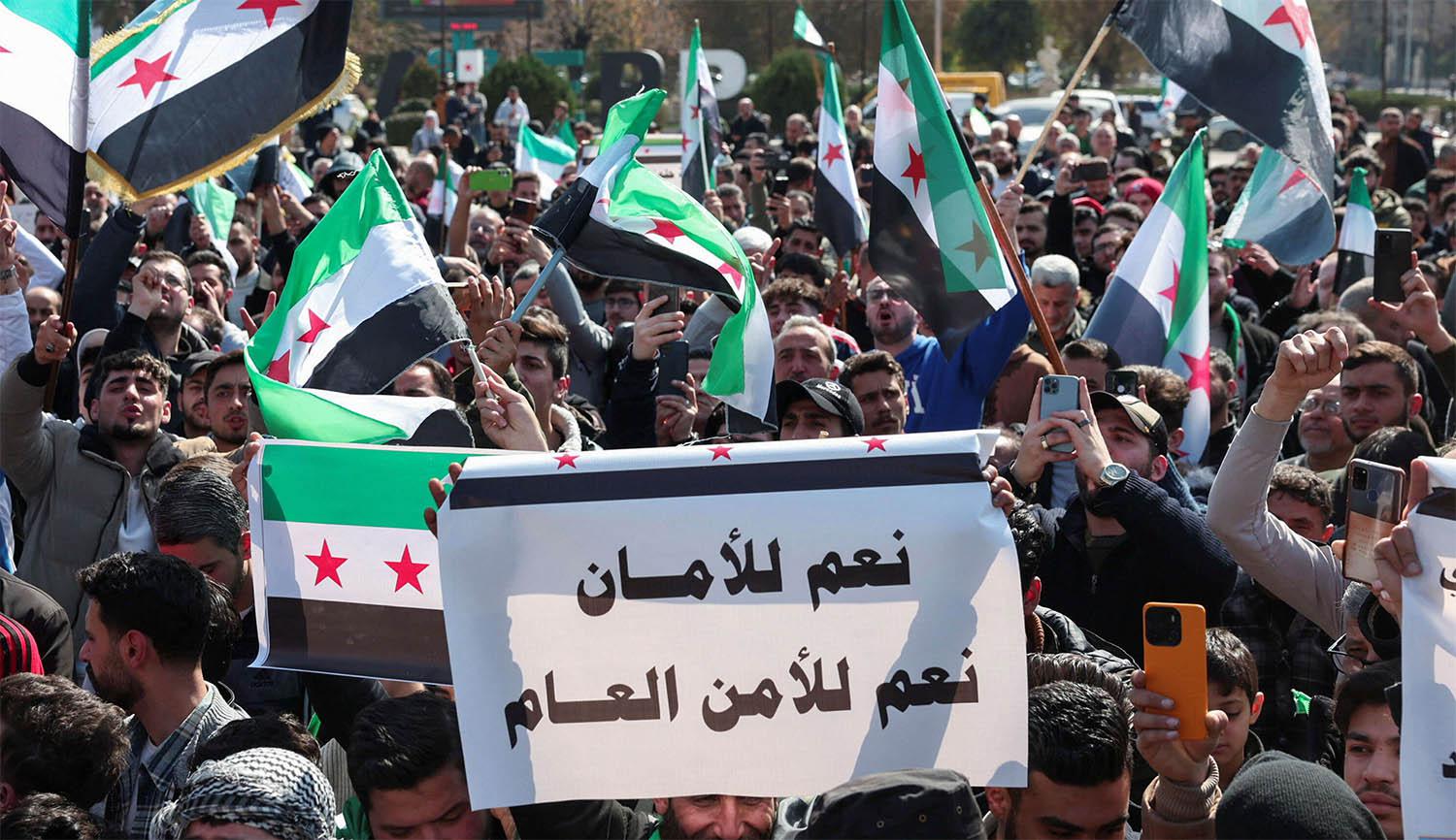 Syrians demonstrate in support of the Syrian government in Aleppo