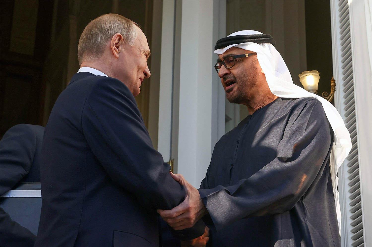  Russia's President Vladimir Putin shakes hands with UAE President Sheikh Mohamed bin Zayed bin Sultan al-Nahyan following their talks at the Kremlin in Moscow on October 21, 2024