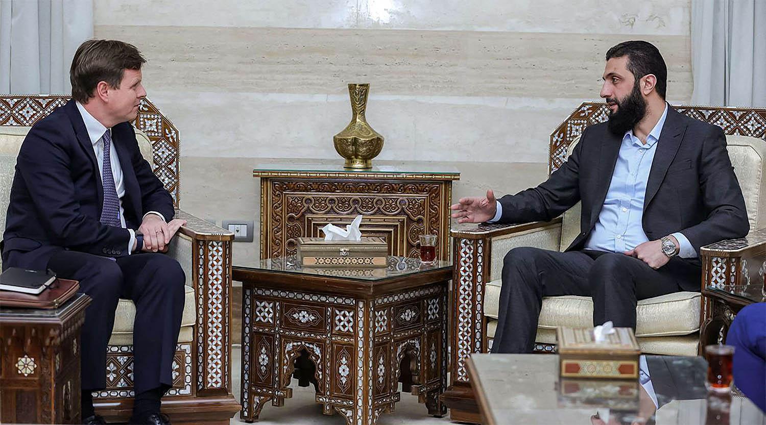 Sharaa receiving Stephen Hickey, the director of the Middle East and North Africa department at Britains Foreign, Commonwealth, and Development Office in Damascus last December