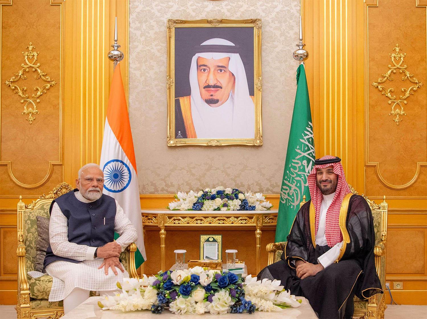 Saudi Crown Prince Mohammed bin Salman (R) meets Indian Prime Minister Narendra Modi at Al Salam Royal Palace in Jeddah