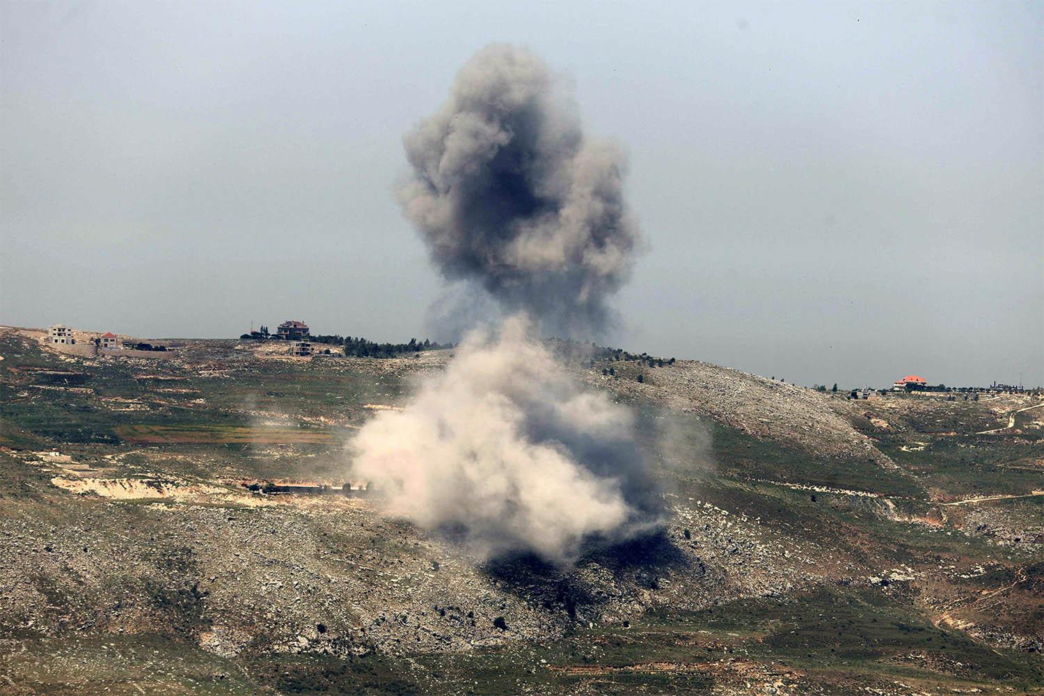Smoke billowing from the site of Israeli airstrikes on the hills of the southern Lebanese village of Nabatiyeh
