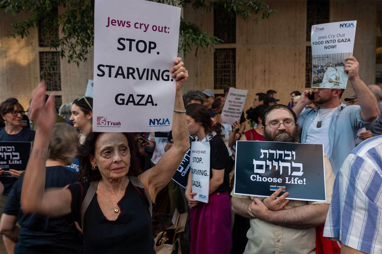 Protesters gather to demand that Israel let more aid into Gaza, outside the Israeli consulate in Manhattan 