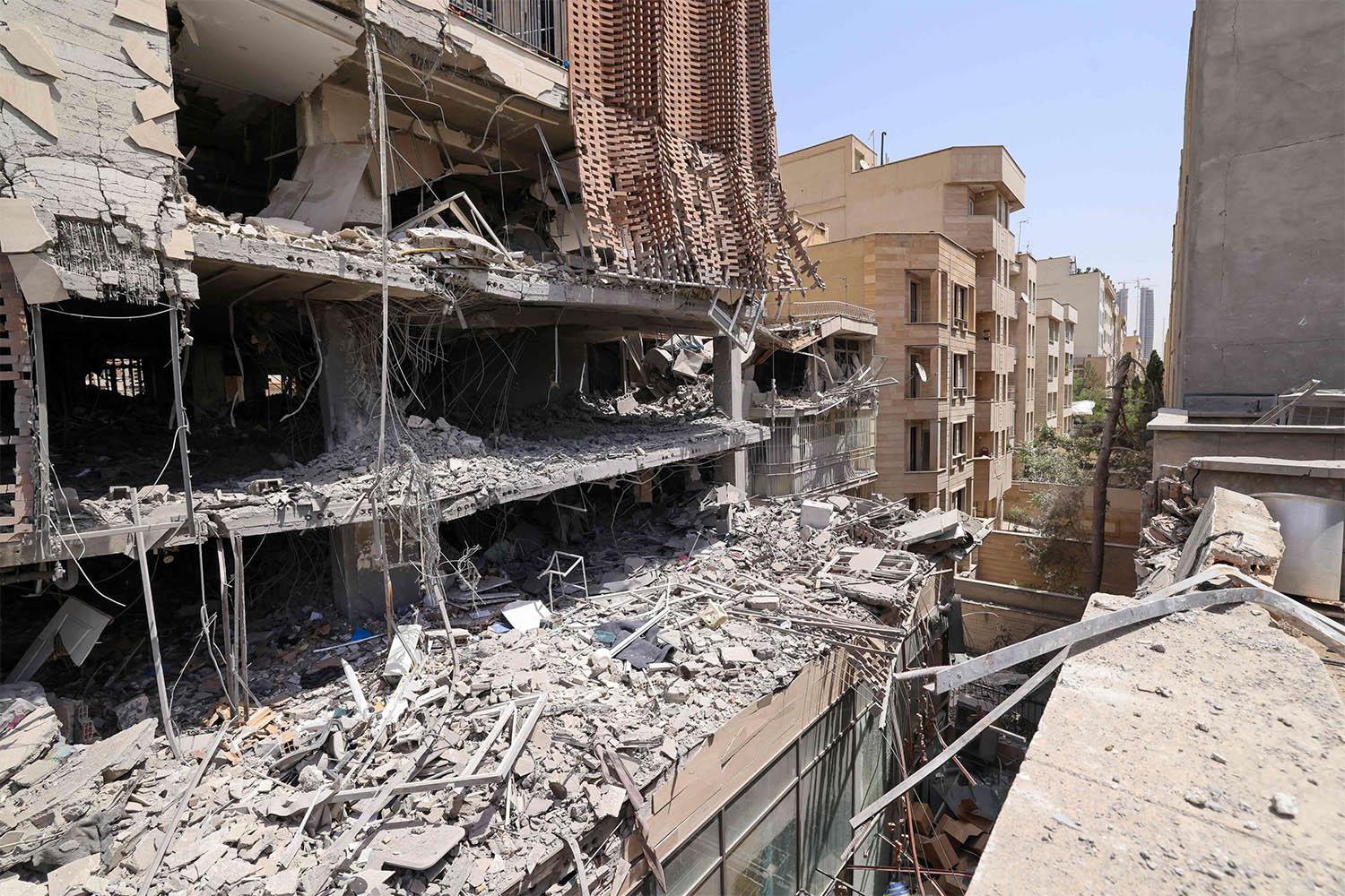 This picture shows a destroyed residential building that was hit in an Israeli strike, in Tehran, on June 25, 2025