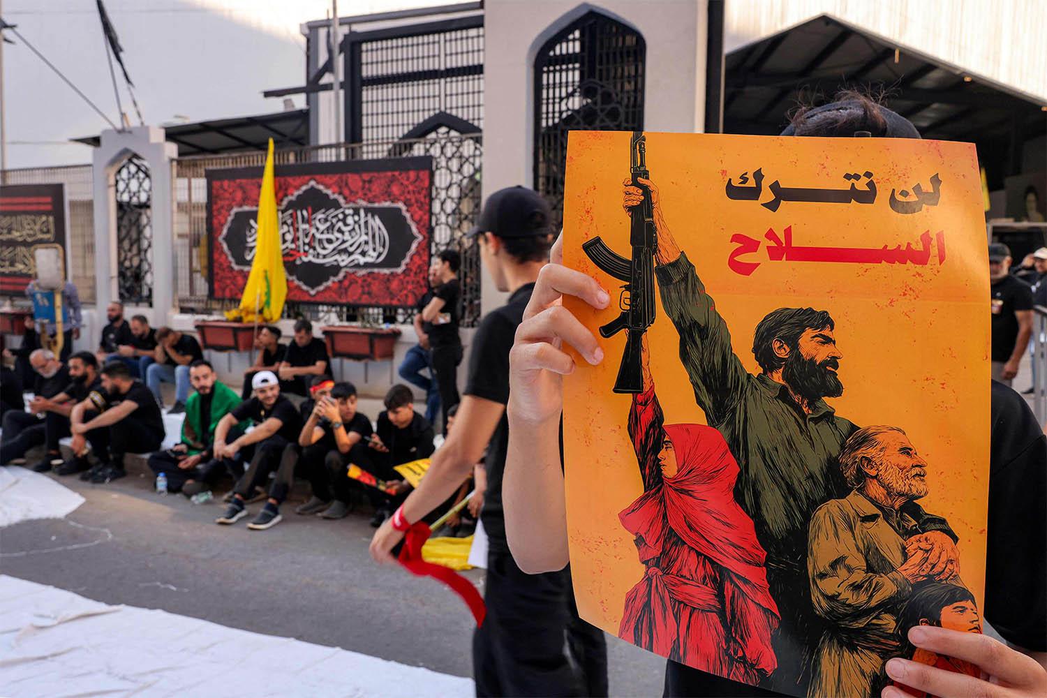 Hezbollah, pounded in the war with Israel last year, refuses to disarm