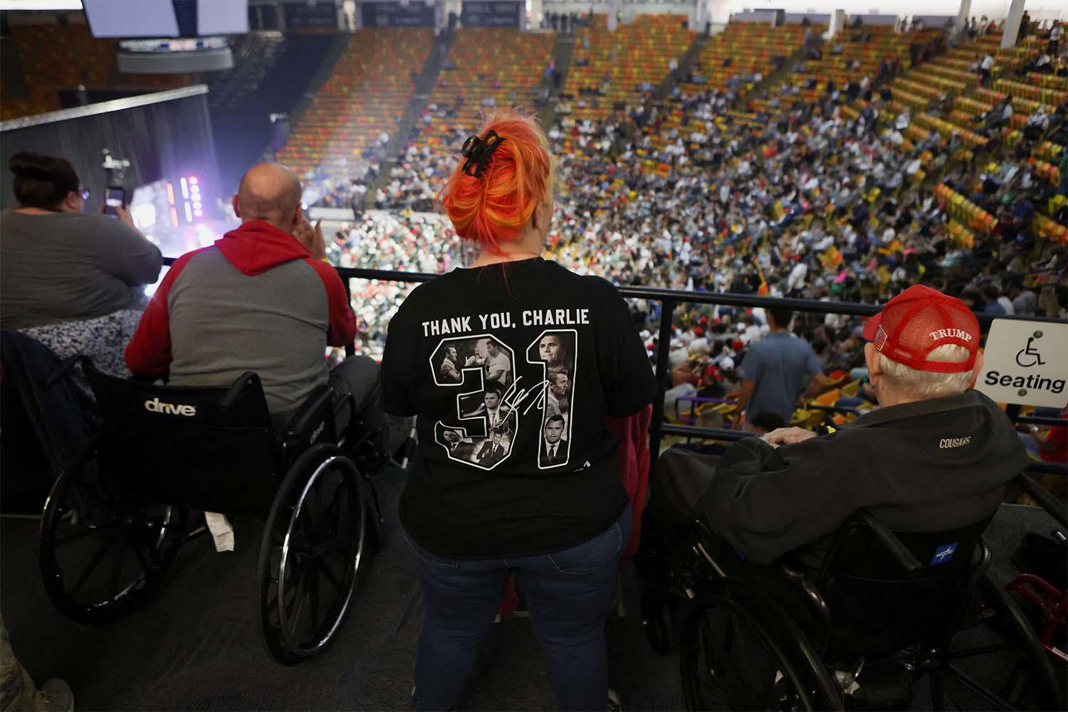 An attendee wears a shirt that reads Thank you, Charlie, ahead of a Turning Point USA event in Logan, Utah, U.S., September 30