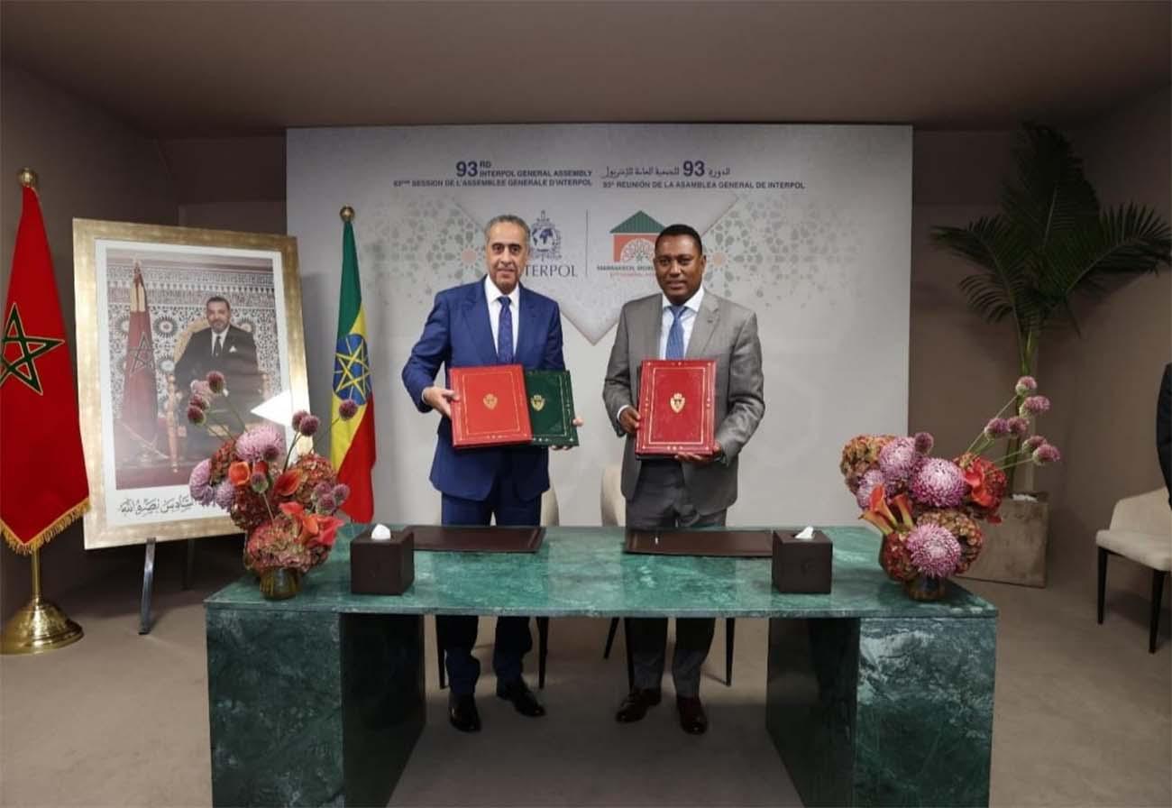 Hammouchi and Gebremichael during the signing ceremony