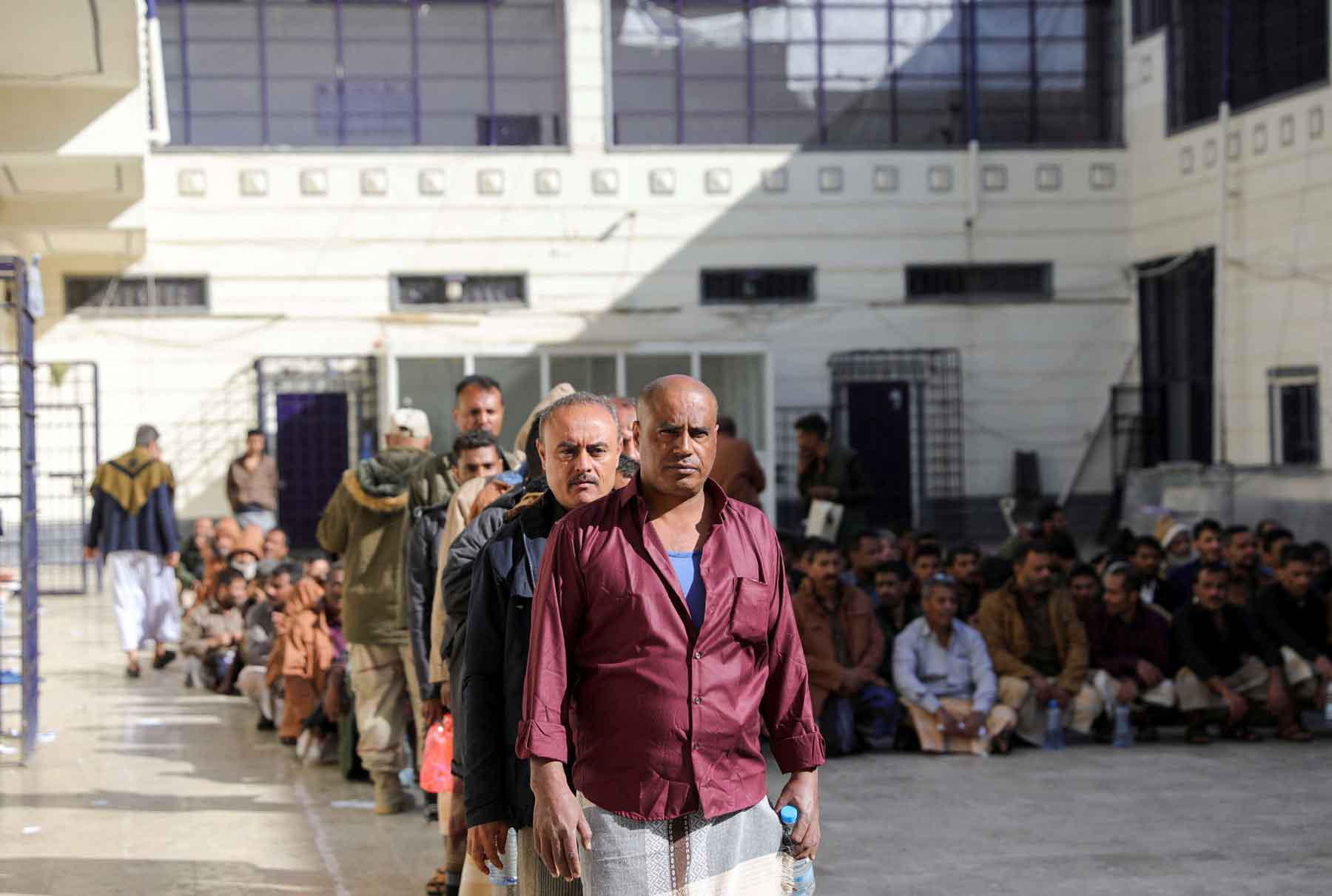 People detained by the Houthis wait for their release in Sana’a, January 25, 2025. 