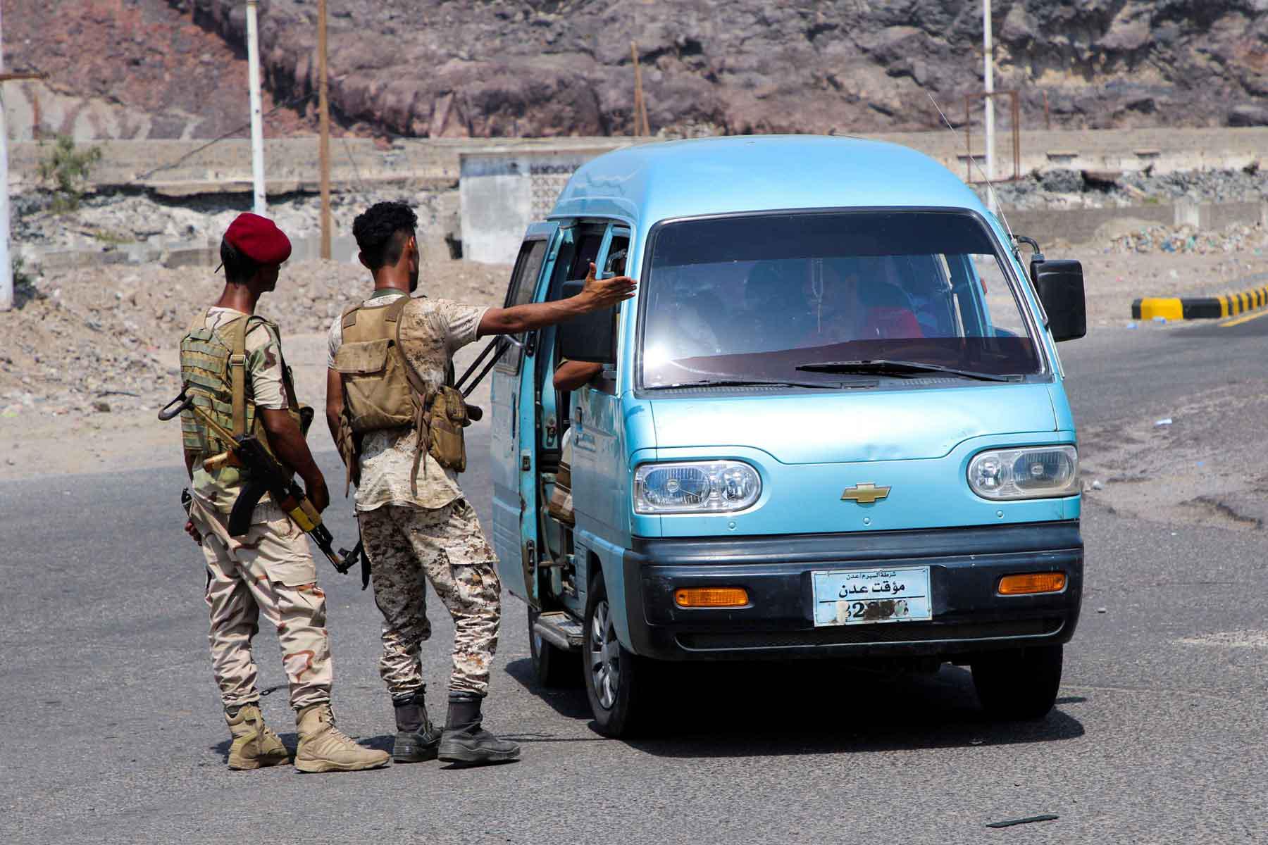 Members of the Southern Transitional Council (STC) man a checkpoint in Aden. 