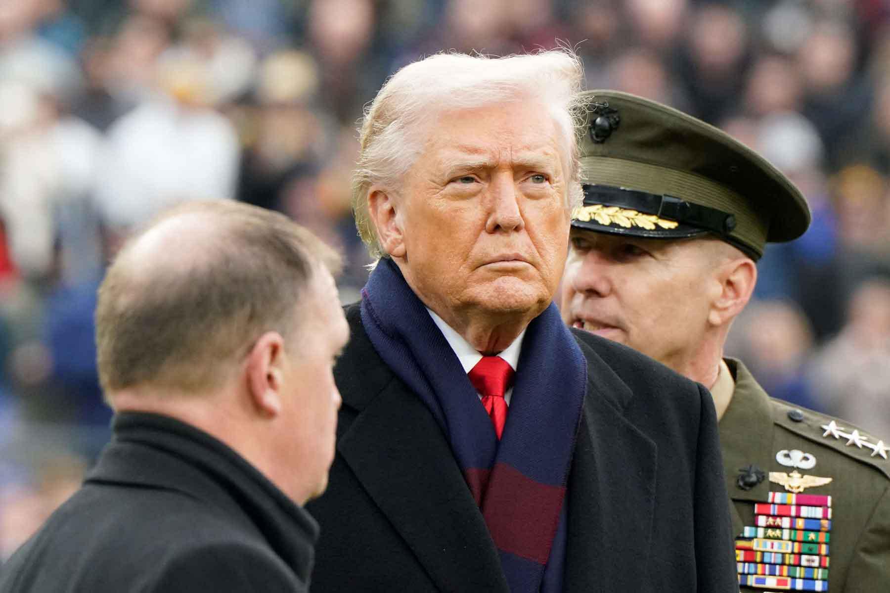US President Donald Trump looks on ahead of the annual Army-Navy football game in Baltimore, Maryland, US, December 13, 2025. 