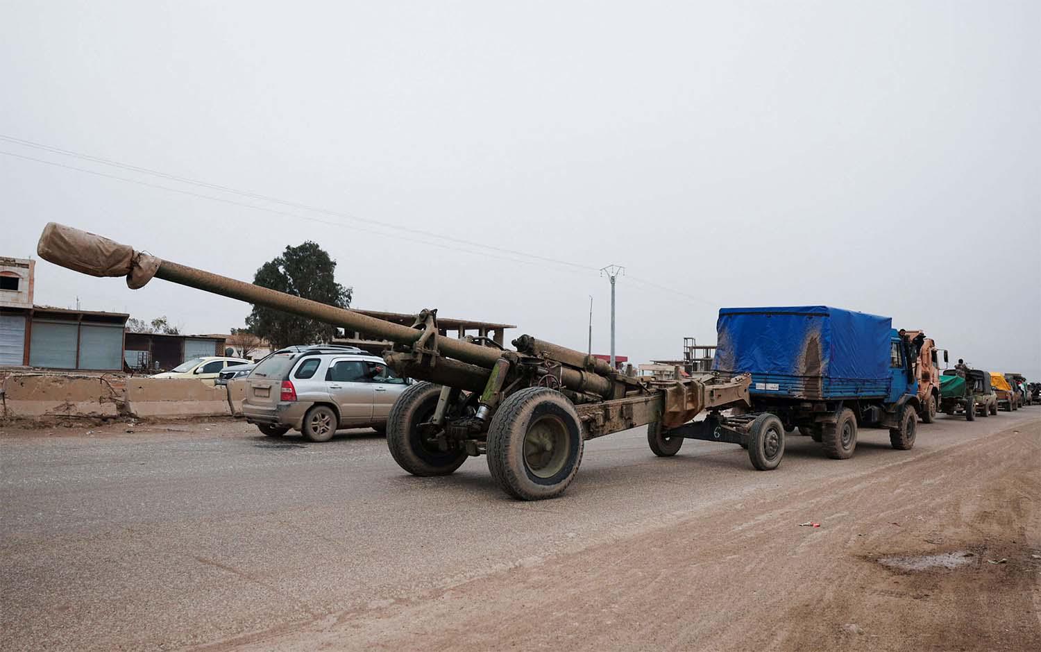 Kurdish forces say the Syrian army breached the withdrawal deal