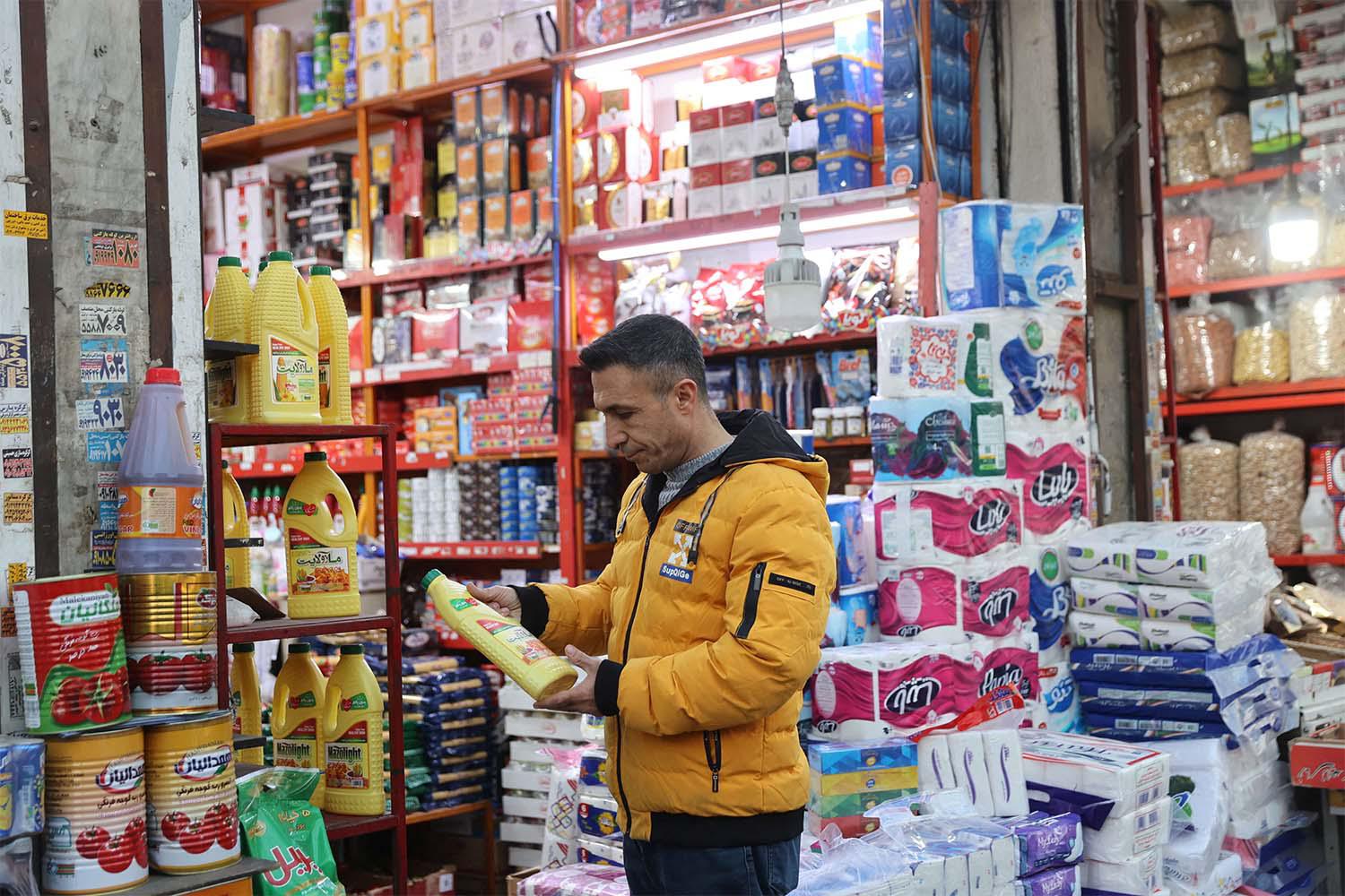 Iranians will be given about $7 a month to purchase basic goods in select grocery stores