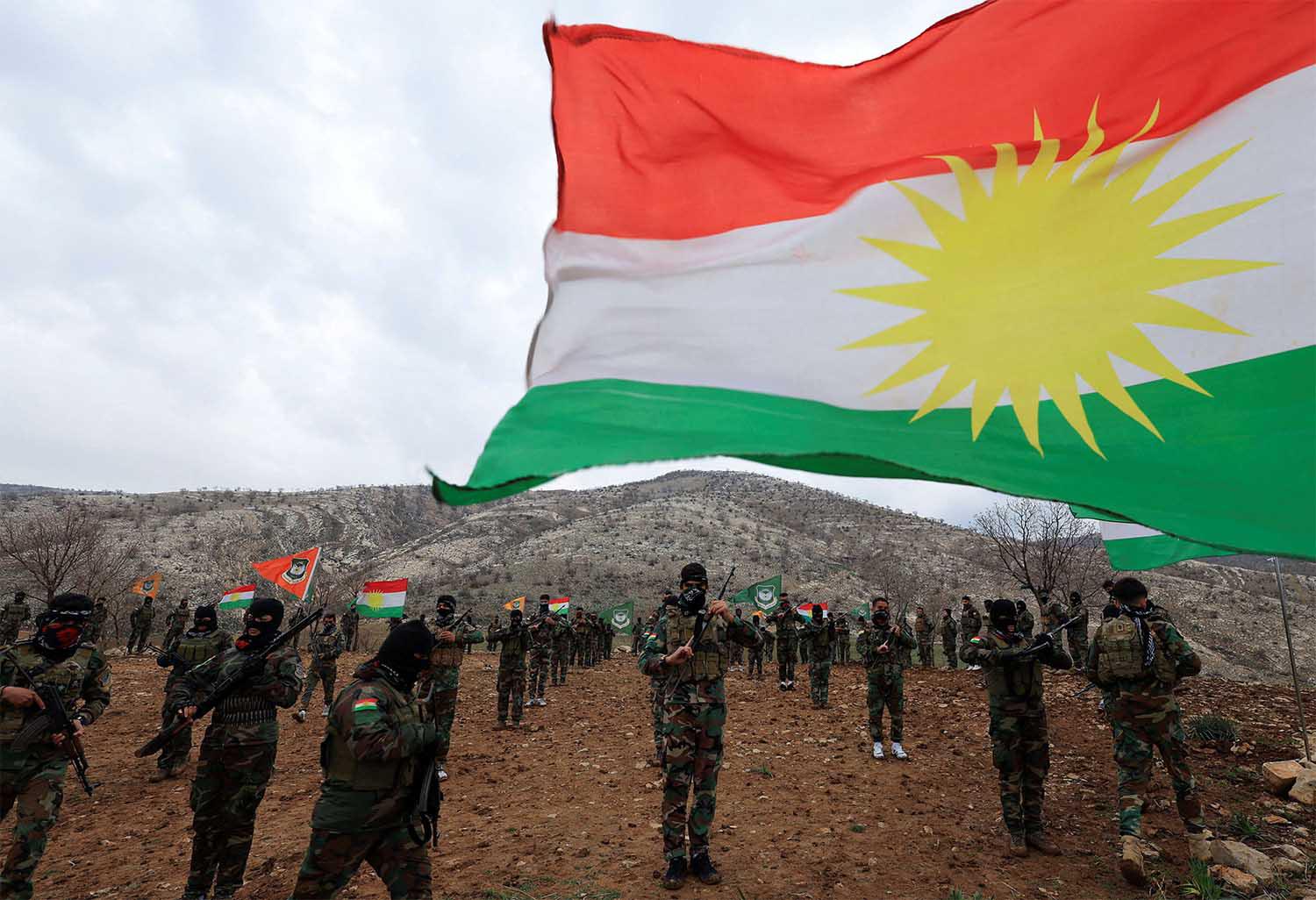  Iranian Kurdish fighters from the Kurdistan Freedom Party (PAK) take part in a training session at a base on the outskirts of Erbil, Iraq 