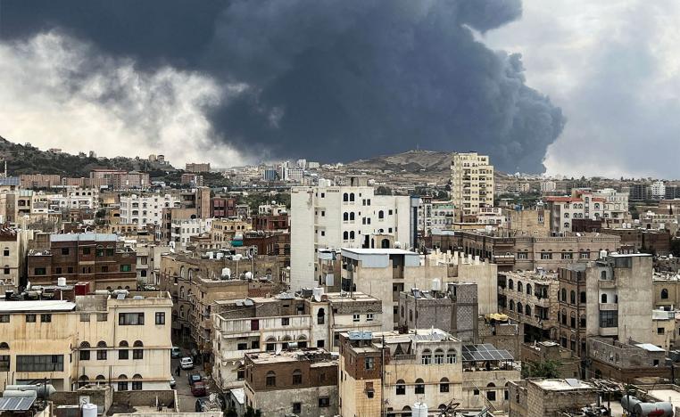 Smoke billows after an Israeli airstrike on Houthi infrastructure, in Sanaa